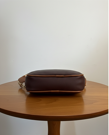 brown sling bag